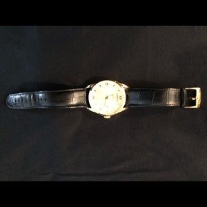 Used men’s gold stainless steel Invicta watch